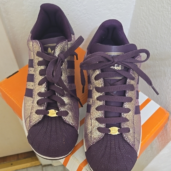 adidas Shoes - Adidas Purple and Gold Sneakers with Striking Stripes